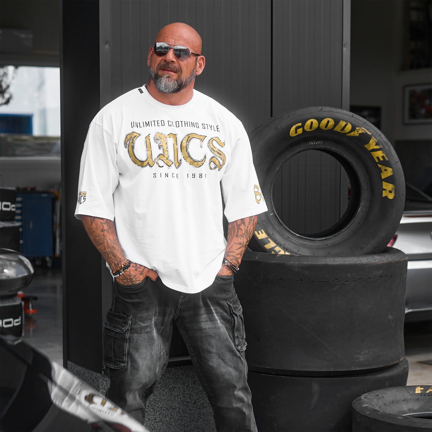 Oversize pánské tričko UNCS v bílé barvě, streetwear styl, až do velikosti 6XL.