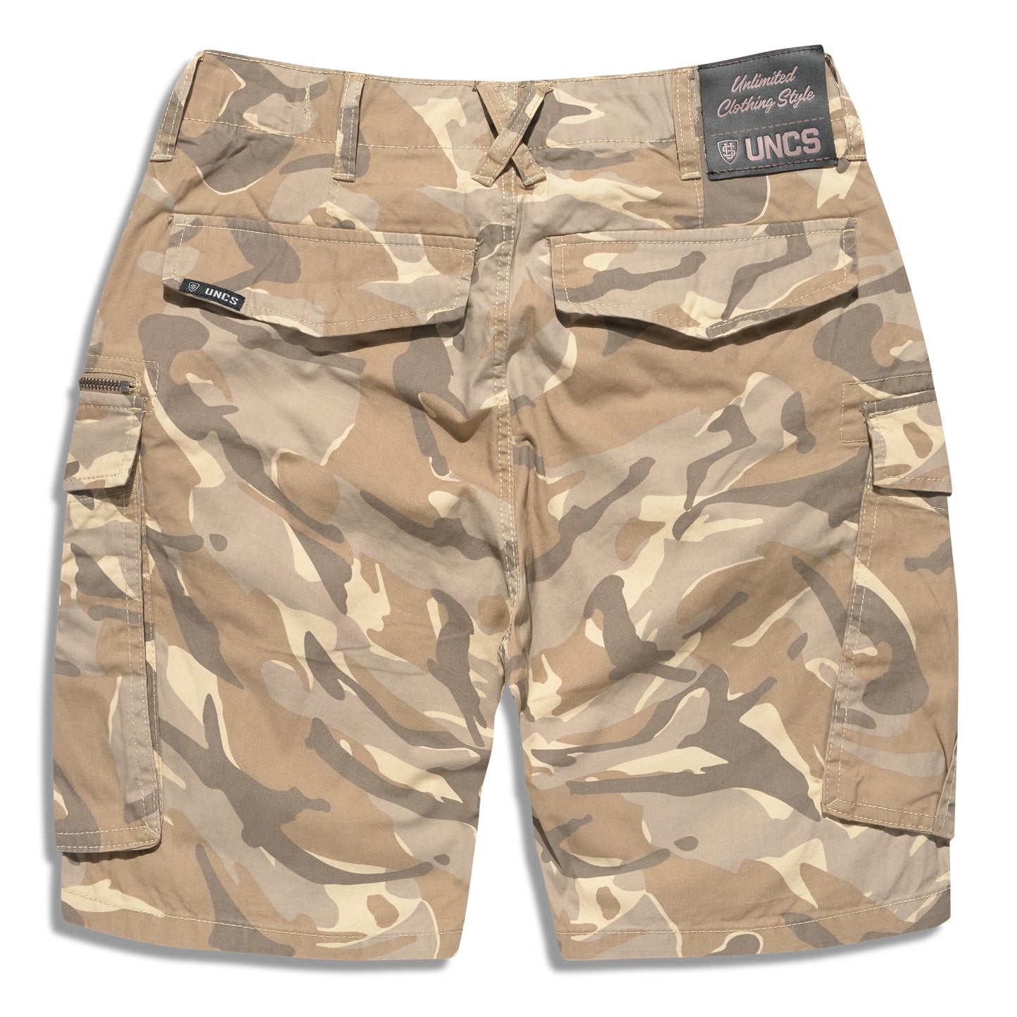 Pánské maskáčové kraťasy UNCS focené zezadu, dvě kapsy na suchý zip, béžový army vzor.