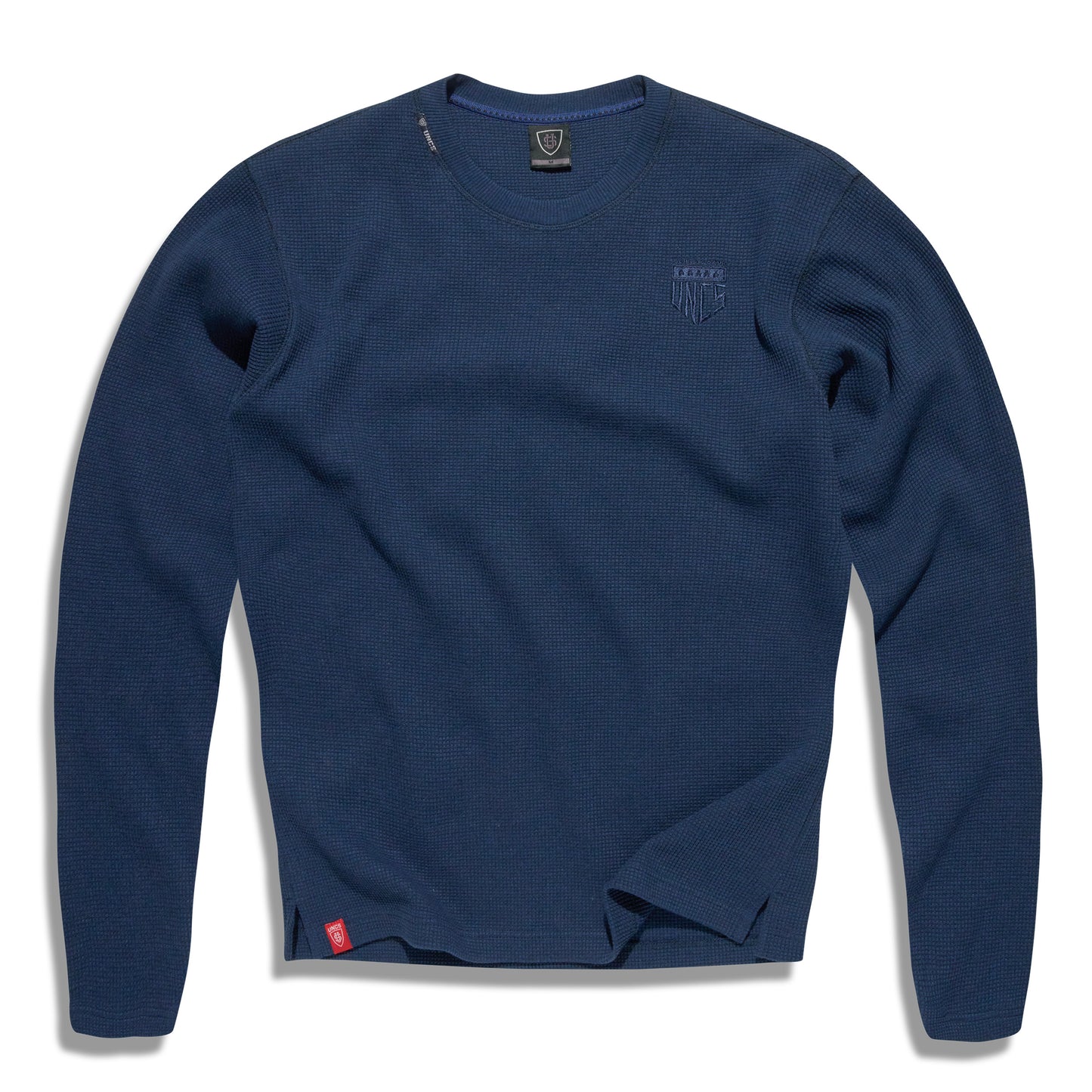 Modré pánské tričko UNCS s dlouhým rukávem, strukturovaný materiál, minimalistický design, pohodlné a odolné, streetwear styl.