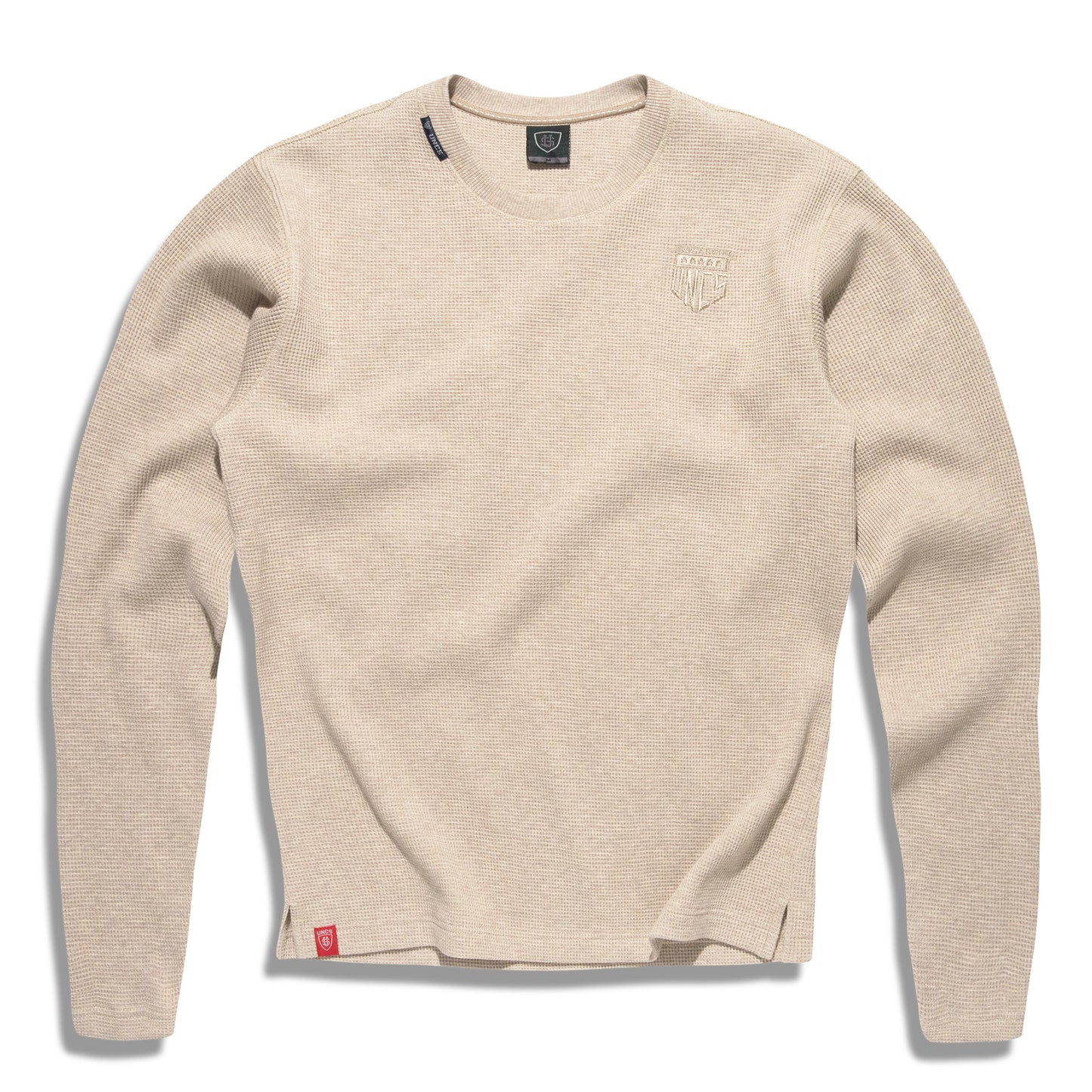 Béžové pánské tričko UNCS s dlouhým rukávem, strukturovaný materiál, minimalistický design, pohodlné a odolné, streetwear styl.