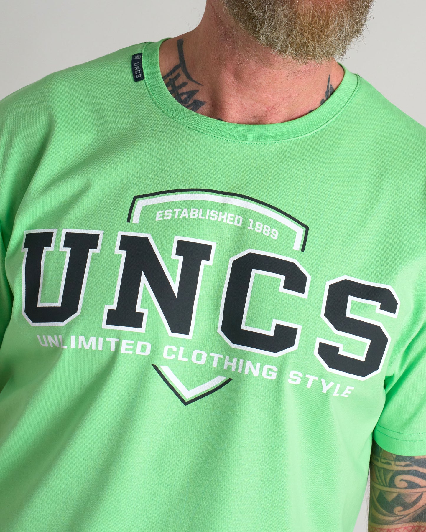 Pánské triko UNCS TEAM II GREEN NEON
