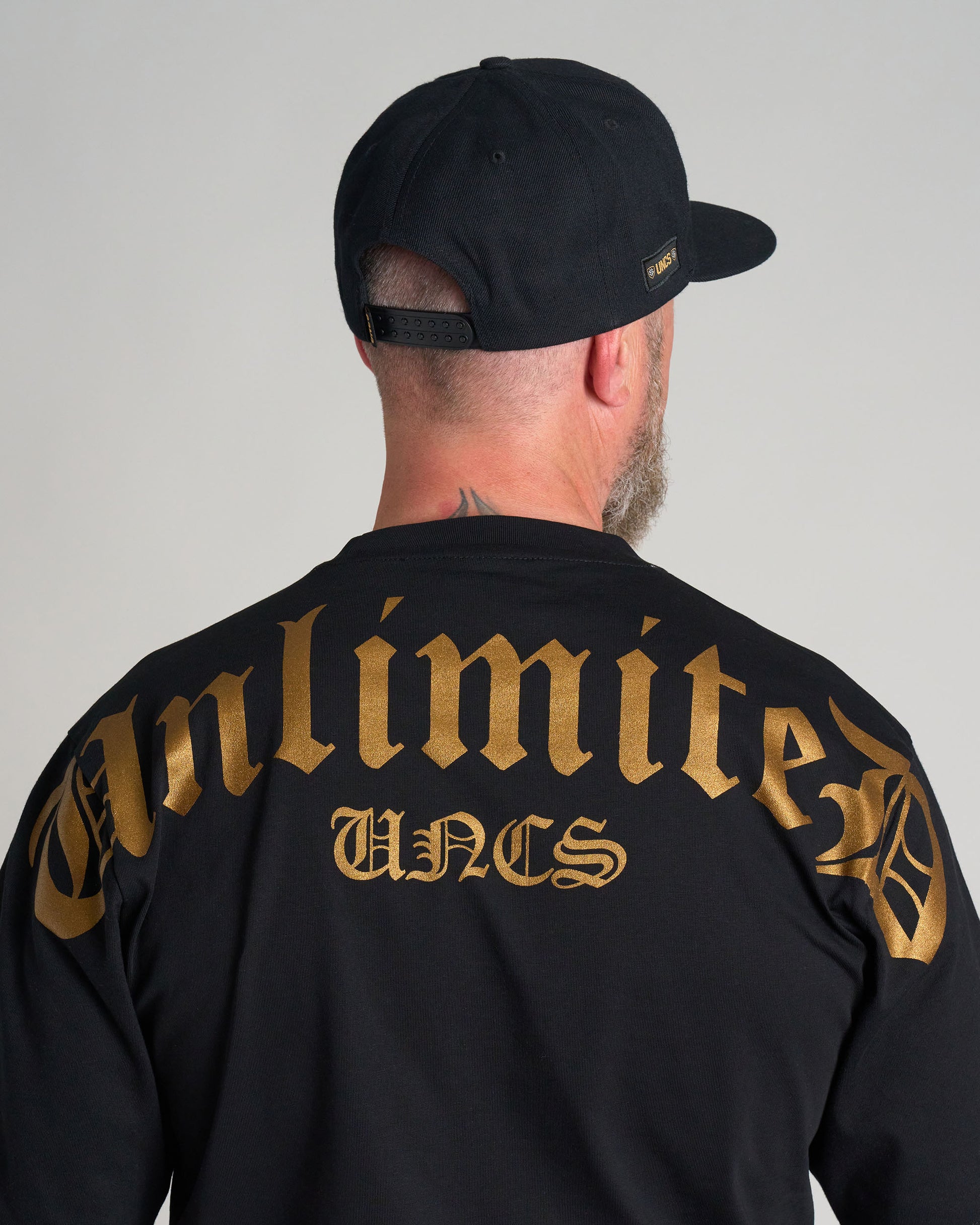 Pánské triko UNLIMITED (OVERSIZE) BLACK/GOLD